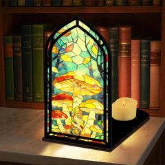Mushroom stained-glass book nook with arched frame, mushroom panel, and small candle