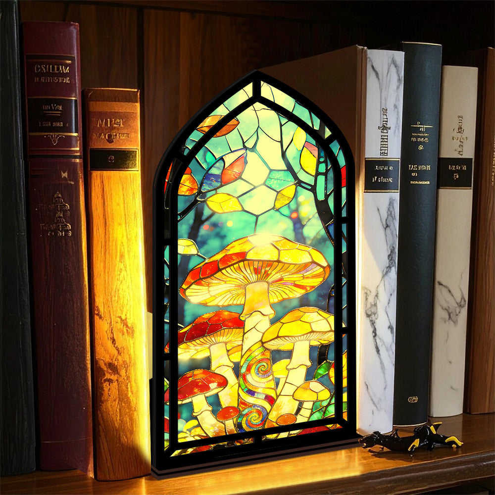 Mushroom stained-glass book nook with arched frame and multicolor mushroom scene panel on base