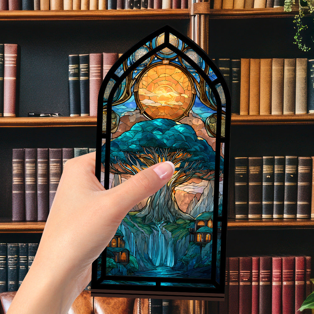 Tree-of-life book nook display with arched stained-glass tree panel, handheld view