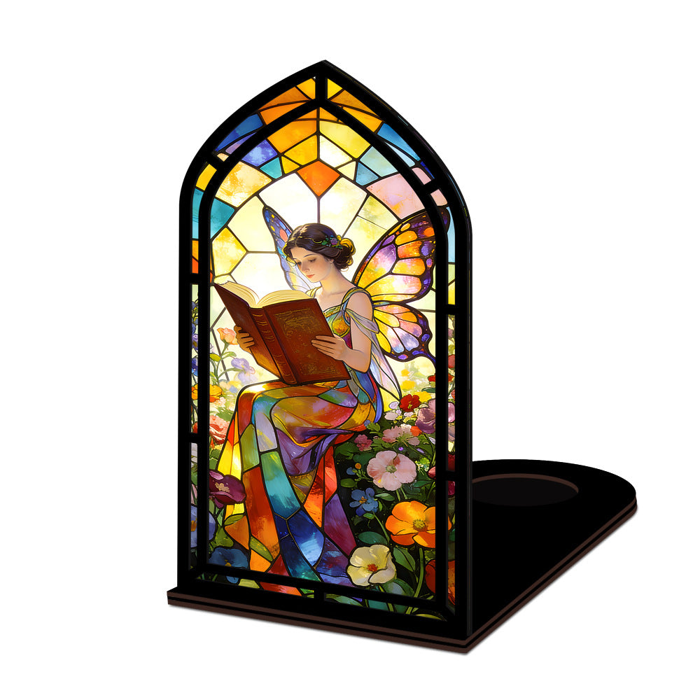 Stained glass fairy book nook with arched reading panel, black frame on flat base